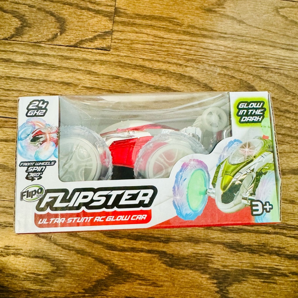 Flipo Remote Control Car Toy, glow-in-the-dark, new in box—orange